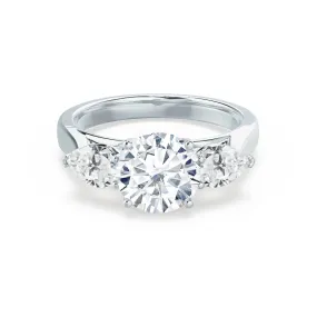 BLOSSOM - Round Moissanite & Pear Cut Diamond 950 Platinum Trilogy Ring